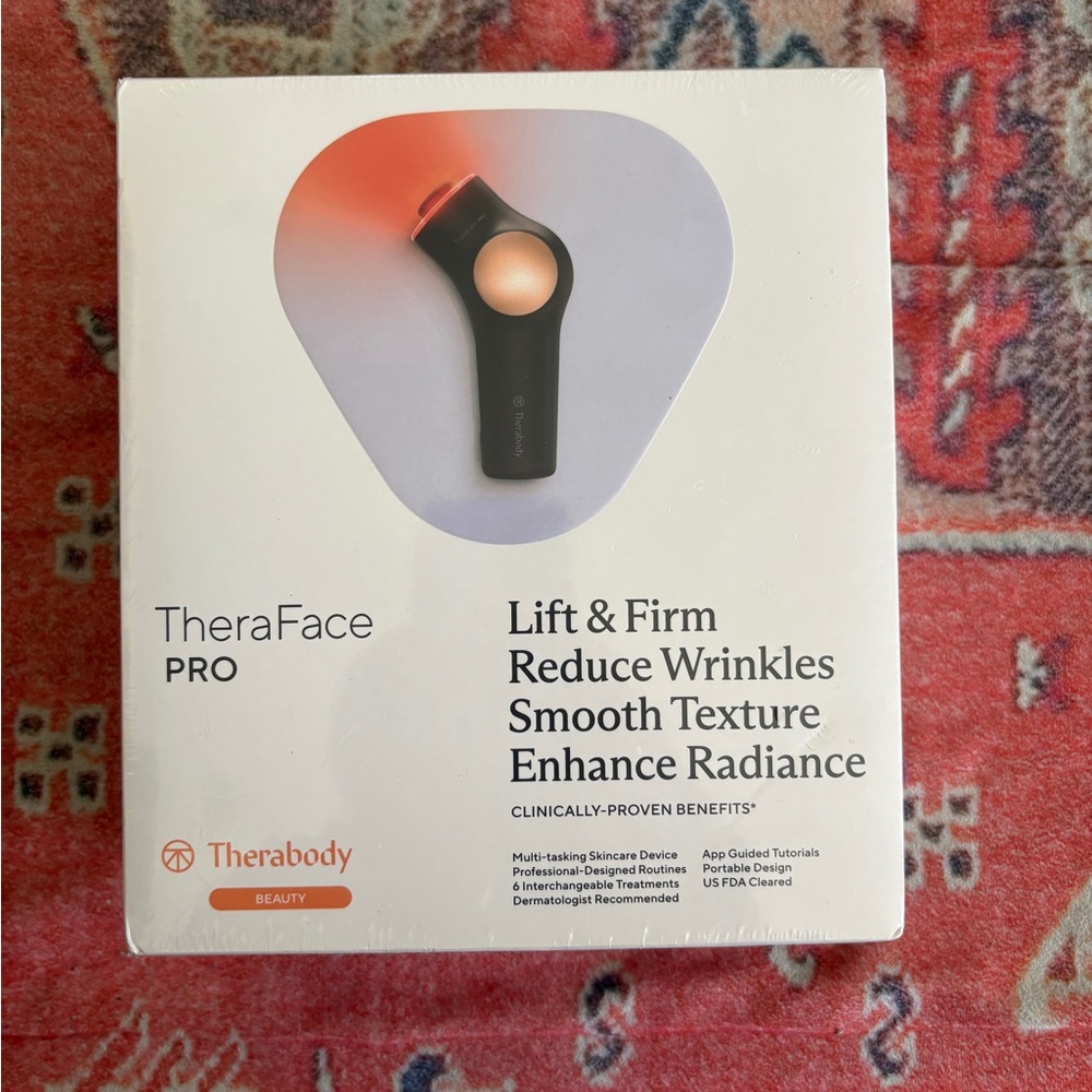 Therabody Skincare Device Packaging - White with Black and Red Accents